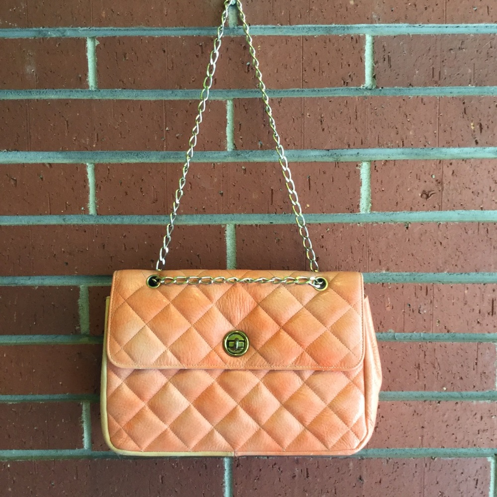 Leather quilted shoulder bag.